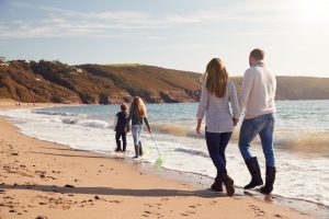 Family on holiday on a UK beach