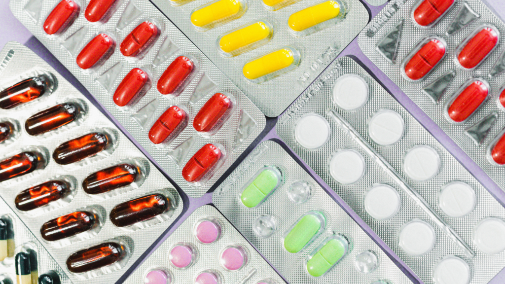 A selection of colour pills in blister packaging